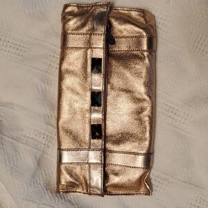 Botkier bag pink shimmery, magnet close/ fold plus zipper.